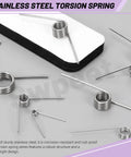 10 Pack 180 Degree Stainless Steel Torsion Springs, 1.5mm Wire Diameter, 15mm Outside Diameter, scattered on table