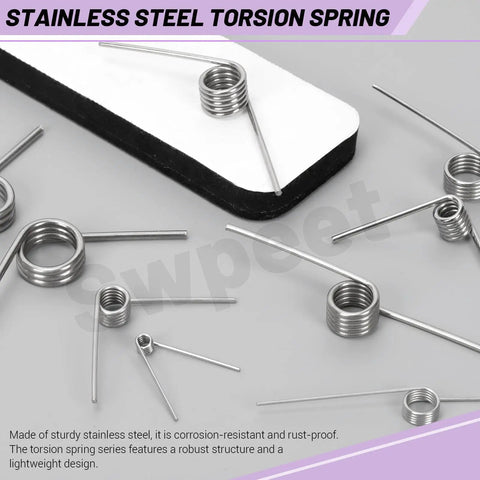 10 Pack 180 Degree Stainless Steel Torsion Springs, 1.5mm Wire Diameter, 15mm Outside Diameter, scattered on table
