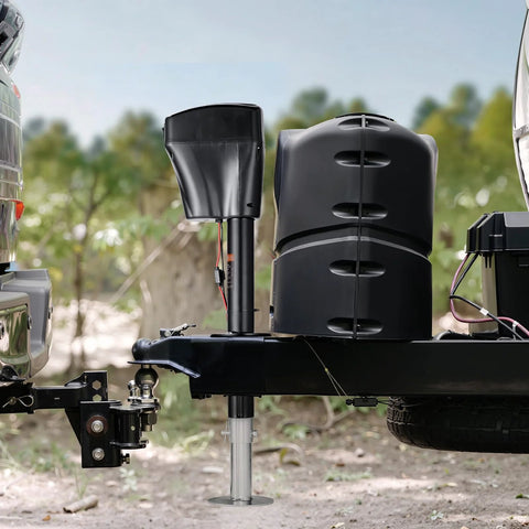 Installed electric trailer jack on trailer tongue, 5000 lb capacity, black with weatherproof cover.