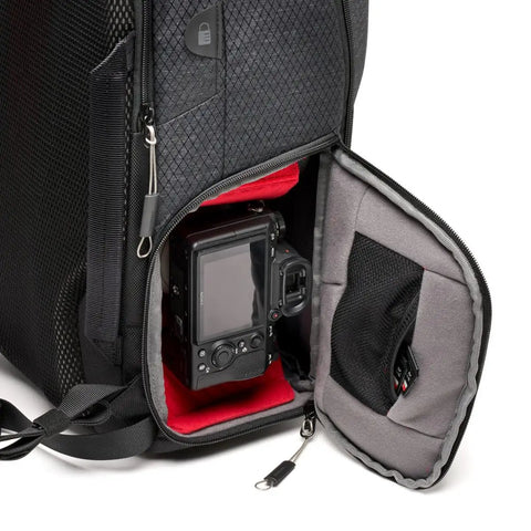 Frontloader M Pro Camera Backpack with side access showing camera storage, padded dividers, and durable black material