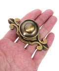 Top Shelf Vintage Zinc Alloy Cabinet Handles With Backplate And Secure Screws 4 Pack Single Hole Drawer Pulls displayed in hand.
