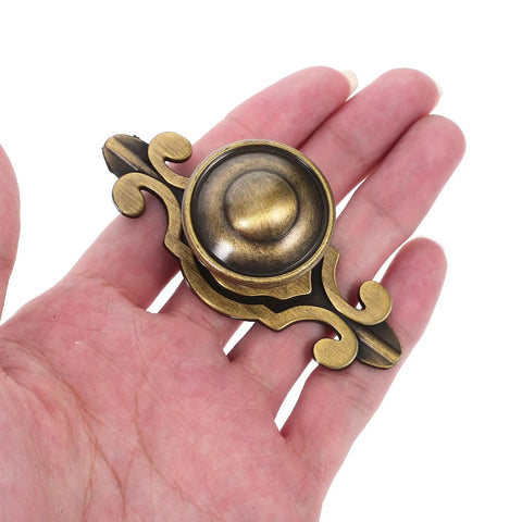 Top Shelf Vintage Zinc Alloy Cabinet Handles With Backplate And Secure Screws 4 Pack Single Hole Drawer Pulls displayed in hand.