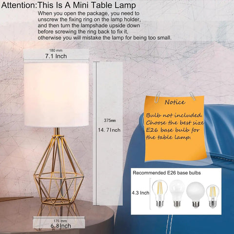 Gold Modern Hollow Out Base Table Lamp With White Fabric Shade on desk, compact 14.2 inch tall geometric base, E26 bulb shown