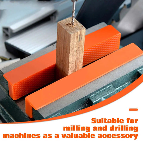 Six Inch Magnetic Vise Jaw Covers With Rock Solid Waffle Grip And Powerful Embedded Magnets For No Slip Clamping shown holding a wooden block.