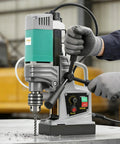 Zhimei 1450W Magnetic Drill Press With Speed Control, Electric Metal Boring Machine For Industrial And Home Use, Powerful Copper Motor, High Torque Drilling Solution, Sturdy And Reliable Performance in operation on a workbench.
