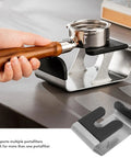 Heavy Duty Built Tough Stainless Steel Portafilter Stand And Espresso Tamper Station for Bottomless Basket in use with handle.