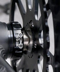 Close-up of Steel Bike Bottom Bracket Wave Washers Set For 24mm And 30mm Cranks installed on a bicycle