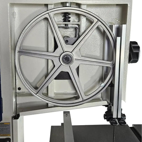 Close-up of Compact 10 Inch Bandsaw With Cast Iron Table And Steel Stand For DIY Woodworkers, showing wheel and tension mechanism.