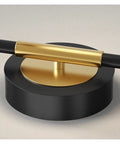 Smooth Matte Iron Wall Lamp Serving Prime Glareless Bedside Reading Glow With Quick Three Color Toggle sleek round base detail in black and gold.