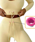 Close-up of a model using 60 Sets Metal Grommets Kit With 3mm Round Eyelets in pink on beige fabric, highlighting DIY apparel use.