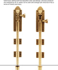 Solid brass sliding bolt with oxidized finish, mounted vertically on white background