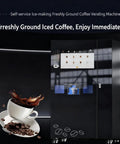 Self-service ice-making freshly ground coffee vending machine with cup of iced coffee and coffee beans on display.