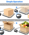 Rock Solid Digital Shipping Scale With Dead On Point 440lb Capacity And Easy Read Display showing usage with box and fruits.