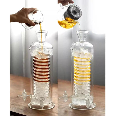 Top Shelf Cold Brew Drip Tower Coffee Maker With Glass Spiral Cooling Tube And Adjustable Faucet Slow Drip System pouring iced coffee.