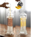 Premium Glass Cold Brew Drip Tower With Spiral Cooling Tube And Distribution Faucet Features A Chill Ice Water Reservoir brewing iced coffee.