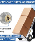 Ten Inch Pneumatic Tire And Wheel Set For Hand Trucks Trolleys Dollies And Garden Carts Two Pack With A Two Point Two Inch Offset Hub And Five Eighths Inch Axle Bore Sealed Bearings Durable Replacement Wheel installed on hand truck carrying boxes.