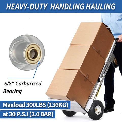 Ten Inch Pneumatic Tire And Wheel Set For Hand Trucks Trolleys Dollies And Garden Carts Two Pack With A Two Point Two Inch Offset Hub And Five Eighths Inch Axle Bore Sealed Bearings Durable Replacement Wheel installed on hand truck carrying boxes.
