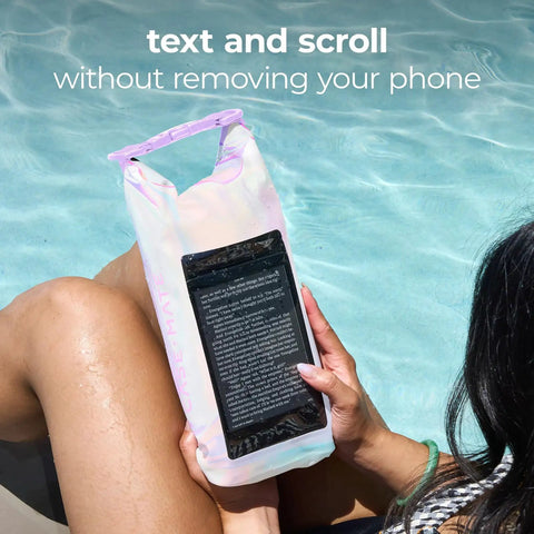 Soap Bubble Mini IP68 Waterproof Bucket Bag 2L Beach Day Must Have Dry Bag For Phones, held in poolside reading position