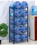 Heavy Duty Carbon Steel Water Jug Storage Rack For Five Gallon Bottles Stackable And Rust Proof Kitchen Organizer holding multiple jugs.