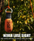 Arborist Throw Line Kit With 15 Oz Throw Weight And 196 Ft Paracord Rope, visible in forest setting for precise tree climbing.