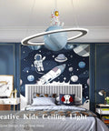 Room with Space Themed Astronaut Pendant Light For Kids Room Dimmable Planet LED Chandelier, wall mural and bedding, 19 Inch 40W