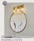 Gold Finish Sleek Modern Vanity Light Fixture With Three Clear Glass Globes Over Mirror For Bathroom Renovation