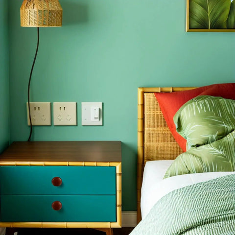 Modern bedroom with teal wall, wooden dresser featuring 10 Pack Rock Solid Round Wooden Cabinet Knobs For Kitchen Cupboard Refresh.