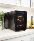 Sleek black Six Bottle Wine Fridge With UV Protective Glass Door And Soft Interior Lighting Freestanding Beverage Cooler displayed on a countertop