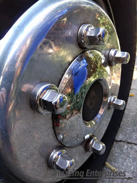 Close-up of Six Pack Lug Nut Cover Set For Mercedes Sprinter Vans With 16 Inch Alcoa Wheels 6 Lug 205mm Bolt Pattern