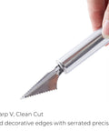 Hand holding V shape carving tool from 2 Piece Spiral Vegetable Cutter And V Shape Carving Tool Set Handheld Stainless Steel Kitchen Tools