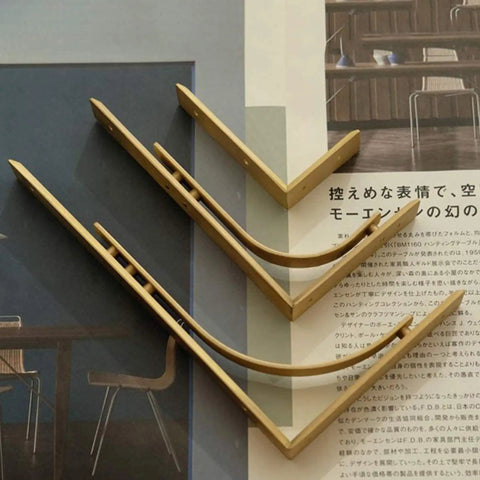 Heavy Duty Shelf Brackets Wall Mount Kickass Brass Metal Supports L Shape set on a magazine page for floating shelves.