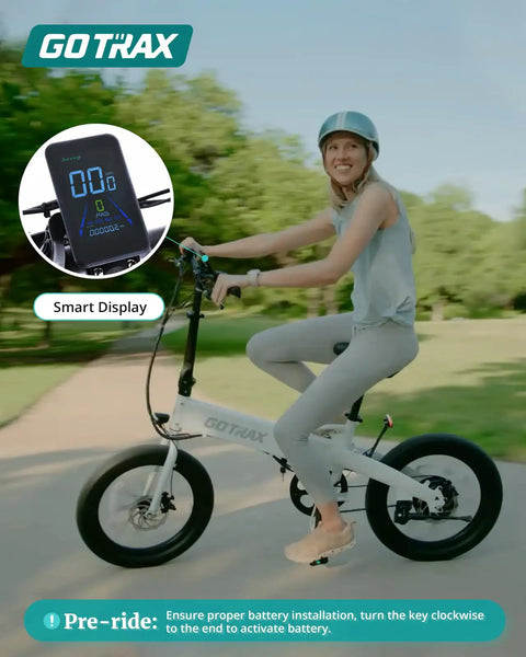 Person riding Foldable 20 Inch Electric Bike With 48V Battery, 40 Mile Range, showing LCD display, in a park setting.