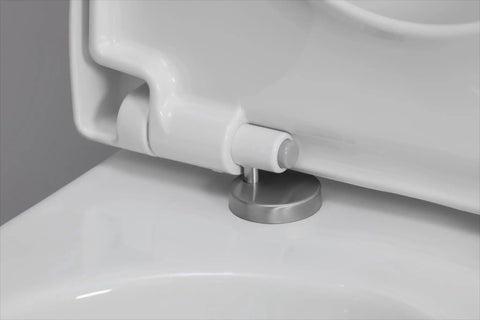 Close-up of stainless steel hinge on universal elongated toilet seat with soft close lid, durable thermoplastic, white.