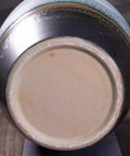 Bottom view of Large Ceramic Airtight Rice Container, showing smooth glazed surface and tight sealing design for pantry storage.