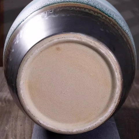 Bottom view of Large Ceramic Airtight Rice Container, showing smooth glazed surface and tight sealing design for pantry storage.