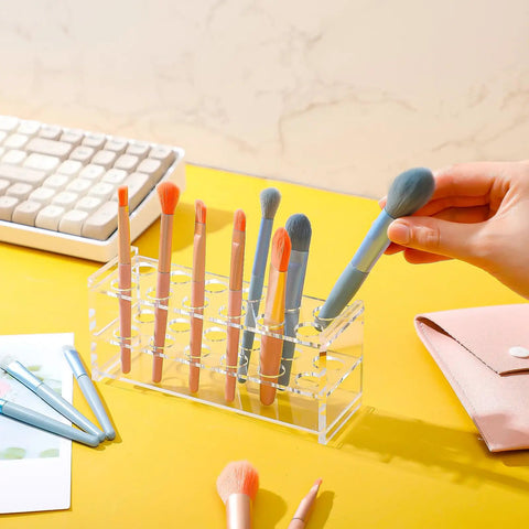 Two Pack Acrylic Test Tube Rack With Twelve Wells For 10ml Tubes used as makeup brush holder on a yellow desk