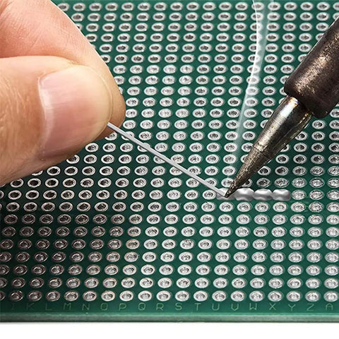 Hand soldering on 72x100mm DIN Rail Mount PCB Board for Arduino DIY Projects with easy soldering insulated holes and dual pitch terminals.