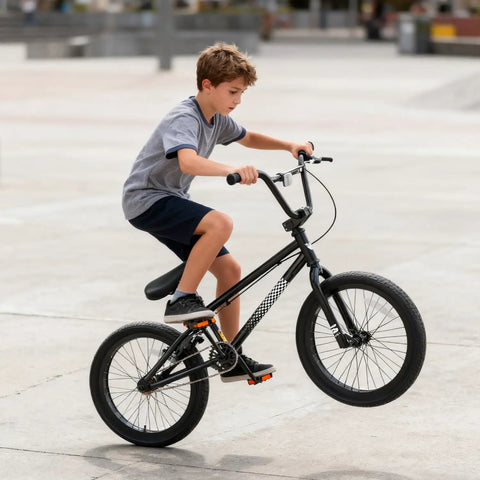 Child riding Freestyle BMX Bike 18 Inch And 20 Inch For Kids Boys And Girls Trick Bicycle For Ages 6 To 12 Hi Ten Steel Frame in park