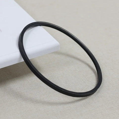 Upgrade Your Vintage Singer 15-88 Sewing Machine With This Durable Motor Drive Belt, black rubber drive belt on a light background.