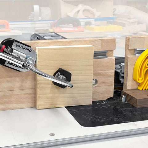 Universal T-Track Clamping System For Woodworking with Non Marring Base shown installed on workbench