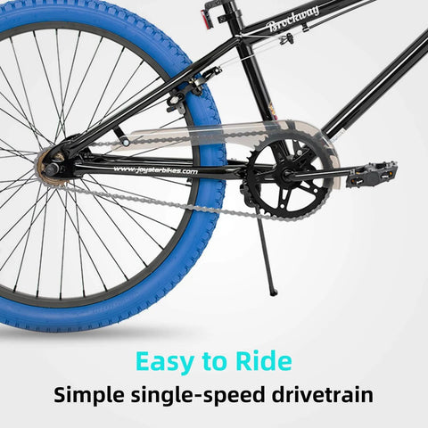 Close-up of 24 Inch Kids Freestyle BMX Bike For Beginners For Boys And Girls Aged 7 To 12, steel frame, blue tires, drivetrain