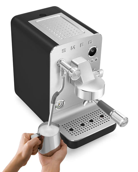 Next Level Semi Pro Espresso Machine Featuring 15 Bar Pump Pressure And Triple Thermoblock Heating For Rock Solid Temp Control And Strong Steam Wand Pulling Real Deal Barista Shots Daily In Glossy Black with milk frothing pitcher.