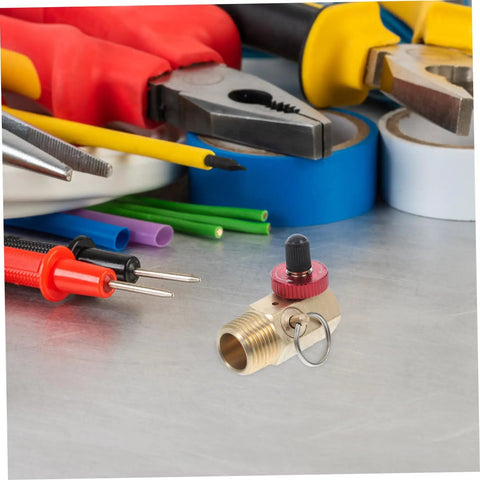 Rock Solid Brass Safety Valve For Air Tank Manifold With Fill Port And Npt Hose Valve Compressor Accessory For Safe Inflation And Pressure Control Built Tough Hella Reliable Two Pack on workbench with tools.