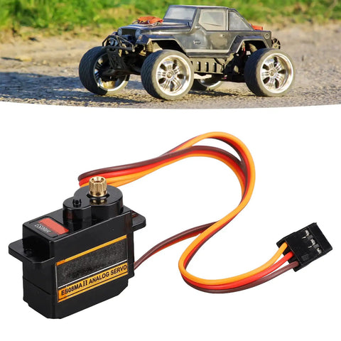 Tough As Nails Micro Servo Motor Kit With Full Metal Gears And Whisper Quiet Operation, showing black servo with wires, ideal for RC vehicles.