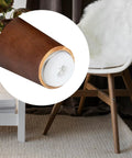 Close-up of M6 furniture leveler screw-on glide on a wooden chair leg, part of the Fix Those Pesky Wobbles Fast With Adjustable M6 Furniture Levelers Screw On Glides That Stay Rock Solid Save Your Floors Easy Twist Design 36 Piece Kit Perfect For Chairs Desks Cabinets And Home Refresh.