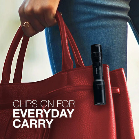 Tac 1AA LED Tactical Flashlight With Clip Water Resistant EDC Light clipped to red handbag for everyday carry