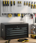 Large Metal Tool Box With Six Drawers And Top Tray, Heavy Duty Steel Chest With Auto Locking Drawers And Side Handles For Garage, Shop And Workbench, Black shown on a workbench.