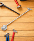 Beefy Heavy Duty Cabinet Door Support Rods Set For Kitchen Cabinets on wooden background with assorted tools, iron material.