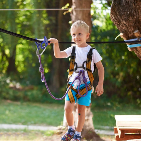 Child using Heavy Duty Zip Line Pulley Kit With Quick Setup Trolley For Outdoor Playgrounds And Backyard Obstacle Courses Safe Durable Design For Kids Aged 5 And Up Boosts Rider Balance And Outdoor Fitness