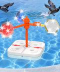Floating Reflective Windmill Bird Deterrent For Pools And Yards Keeps Ducks Geese Pigeons Crow And More Away With Flashing Red And Silver Disturbance And Moving Visuals For Boats Roofs Gardens Backyards on water surface with flying ducks nearby